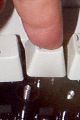 Place your finger directly over the key...